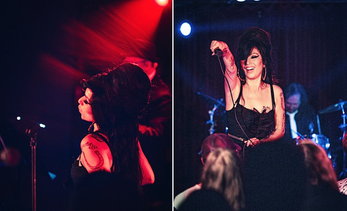 Sängerin mit hochgestecktem Haar und schwarzem Kleid hält Mikrofon auf einer Bühne vor Publikum bei einer Amy-Winehouse-Tribute-Show im Estrel Showtheater Berlin.